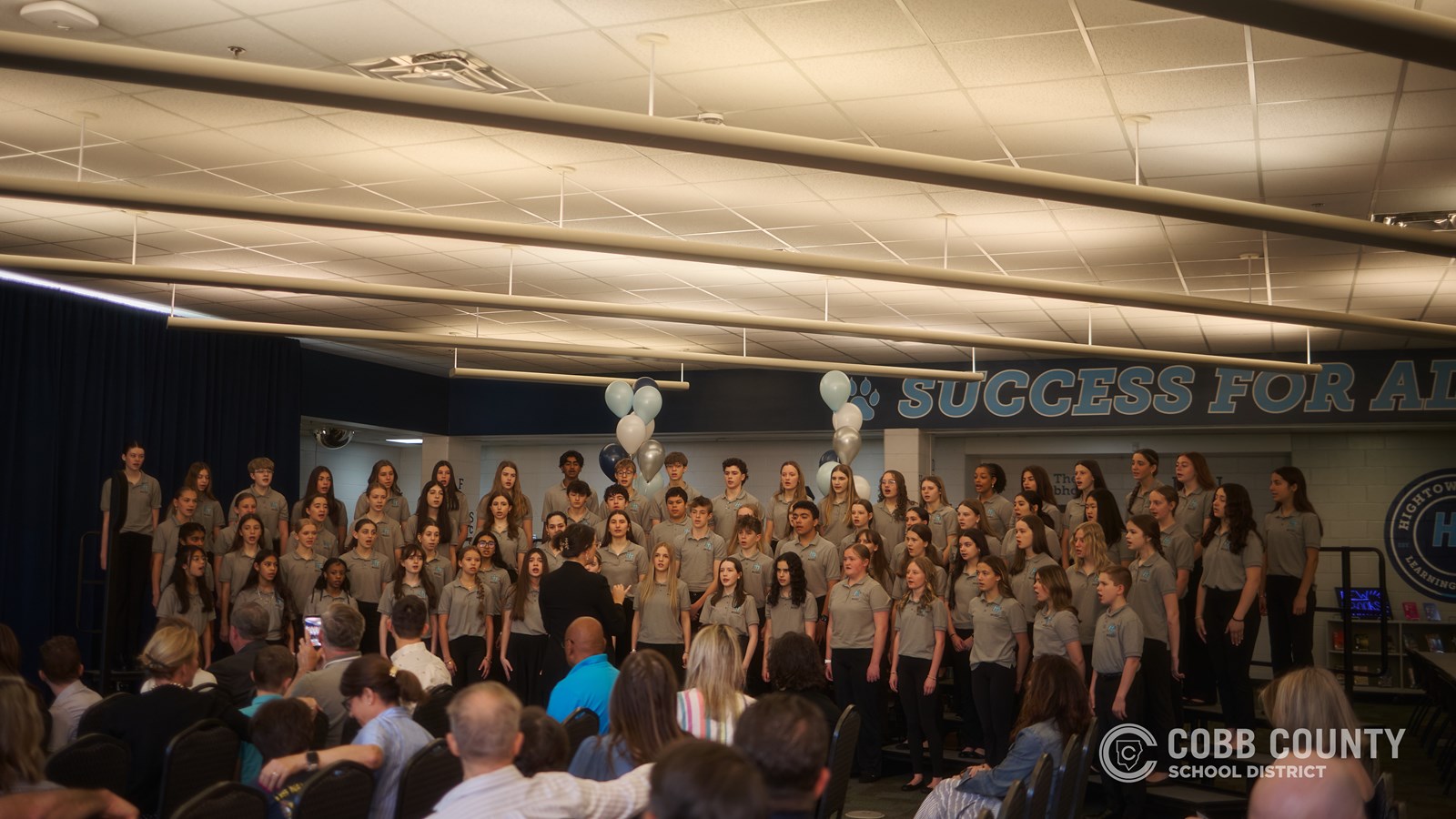 Hightower Trail Middle School community celebrates Military Flagship School recognition ceremony.