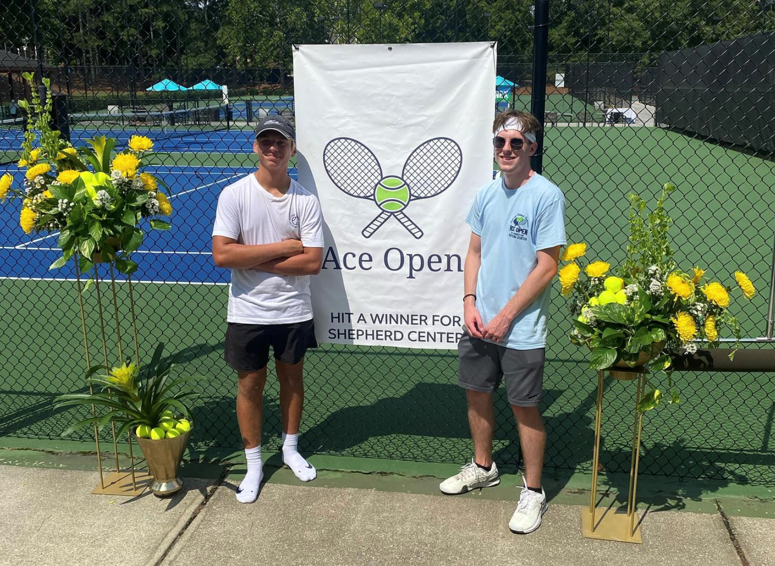 Nolen Jarl in front of Ace Open sign