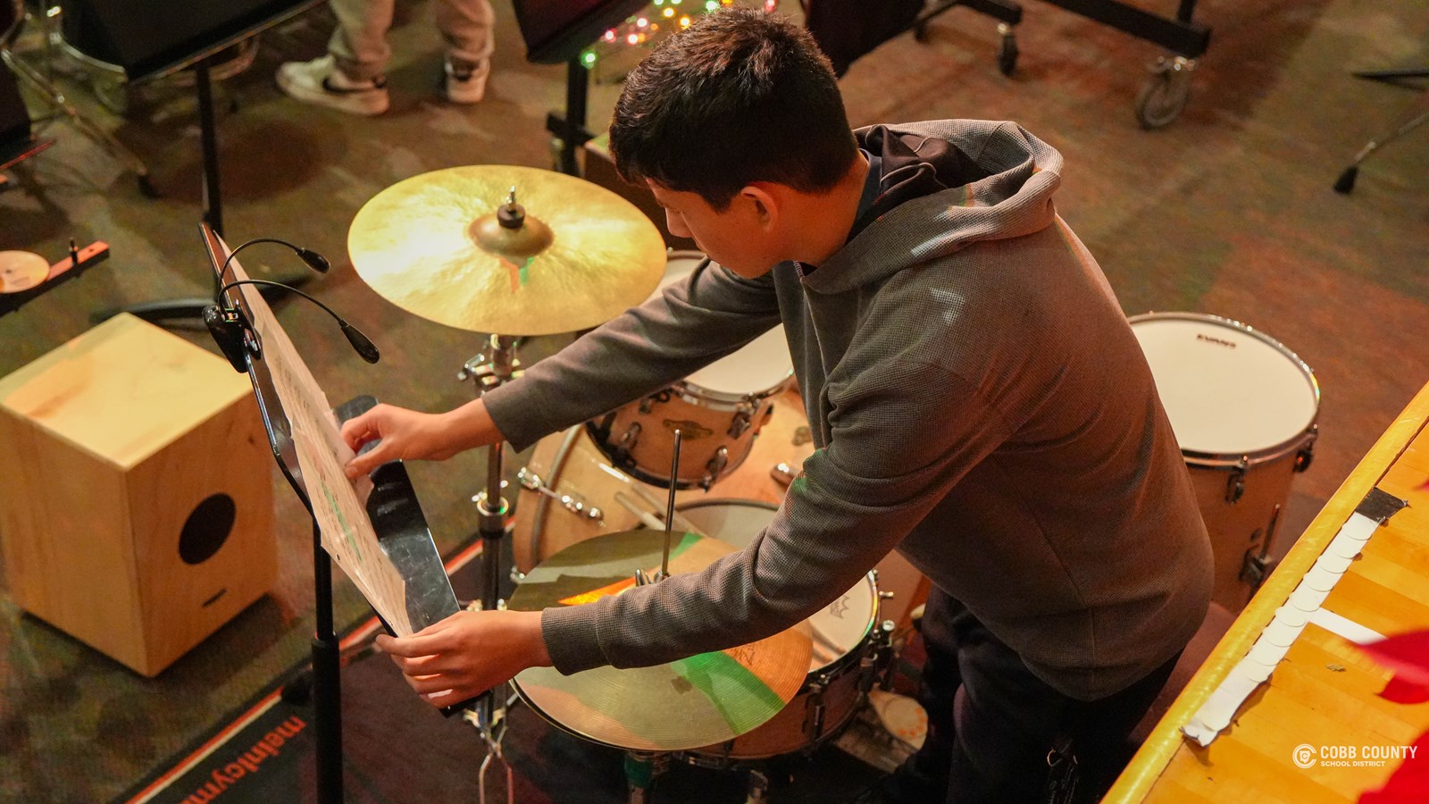 Alvarado practices the drums at Kennesaw Mountain High School.
