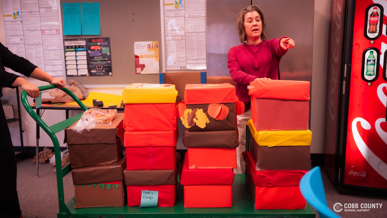 Smitha Middle School sends students home with Thanksgiving supplies.