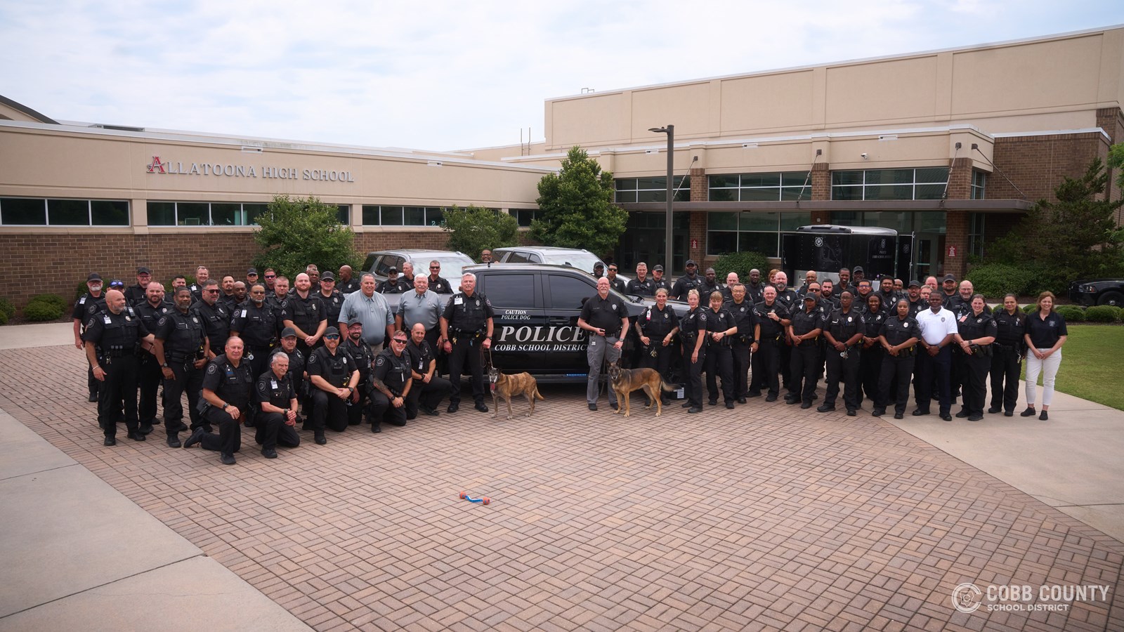 K-9 Sadie, a narcotics detection dog with the Cobb County School District Police Department, is honored during her retirement celebration after 11 years of service supporting school safety across Cobb Schools.