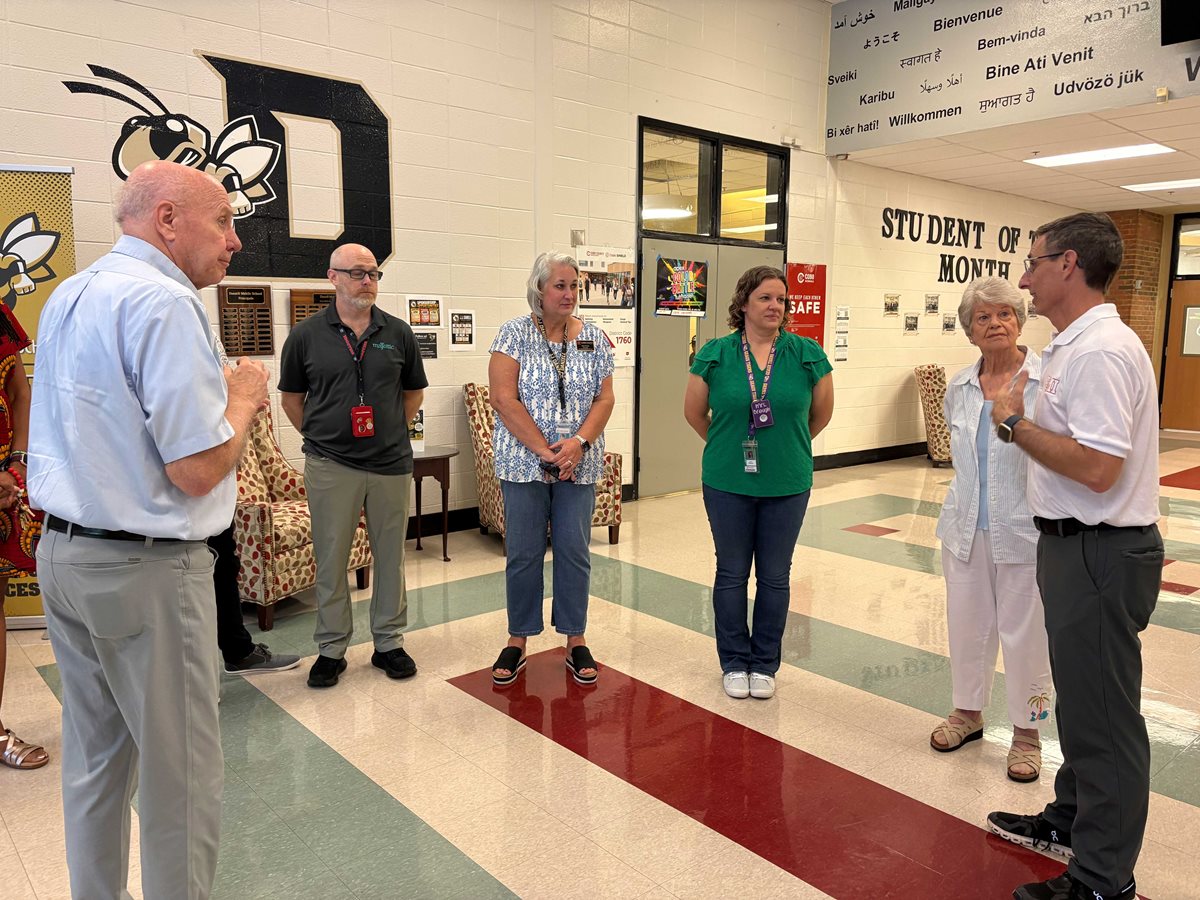 Jim Schmelzer with Daniell Staff
