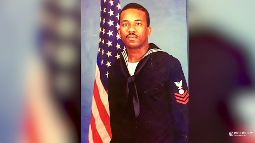 Wilkinson in his uniform during his time with the U.S. Navy.