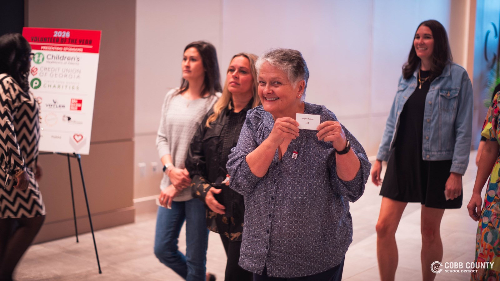 2026 Cobb Schools Volunteers of the Year recognized on stage at the annual luncheon.