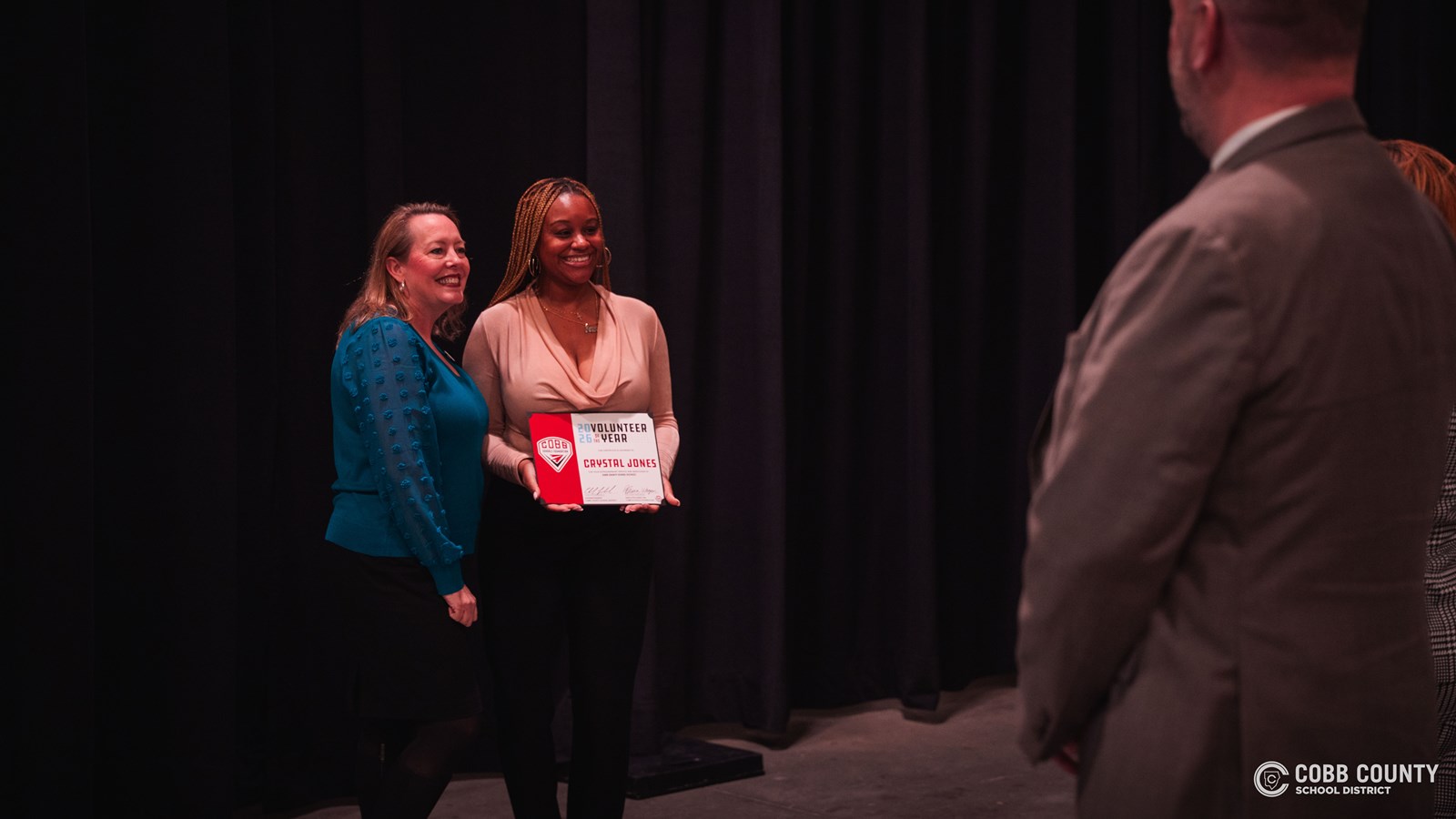 2026 Cobb Schools Volunteers of the Year recognized on stage at the annual luncheon.