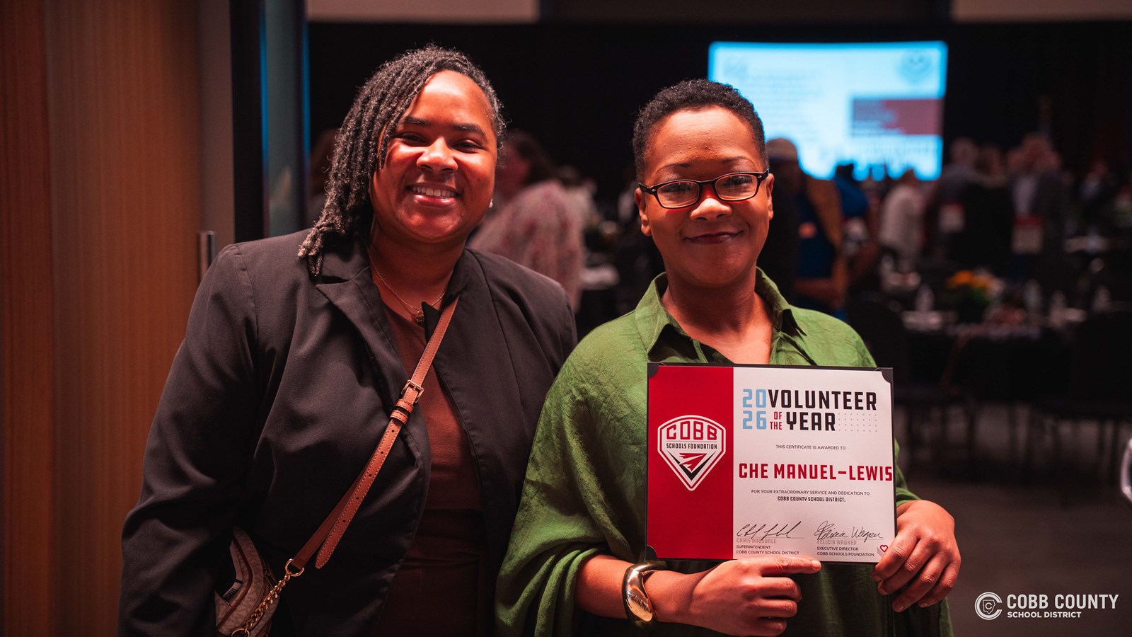 2026 Cobb Schools Volunteers of the Year recognized on stage at the annual luncheon.