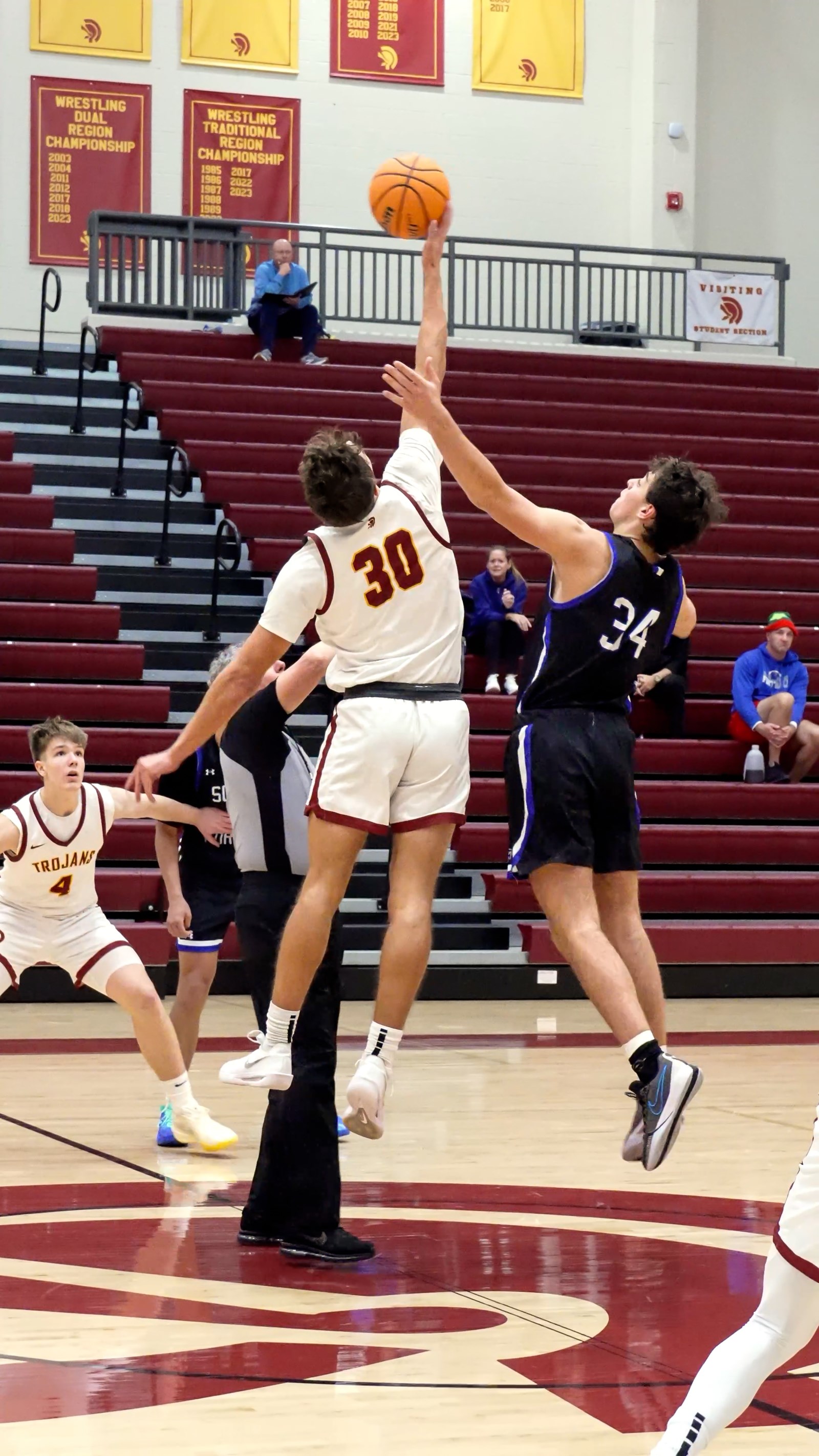 Lassiter's Will Griffis wins the opening tipoff