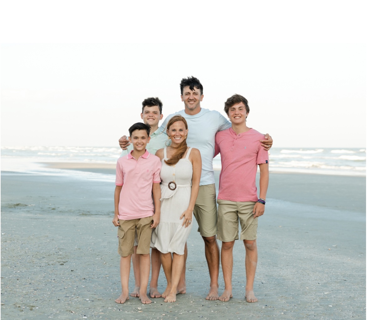 Ashley Graziano with her husband and three sons at the beach