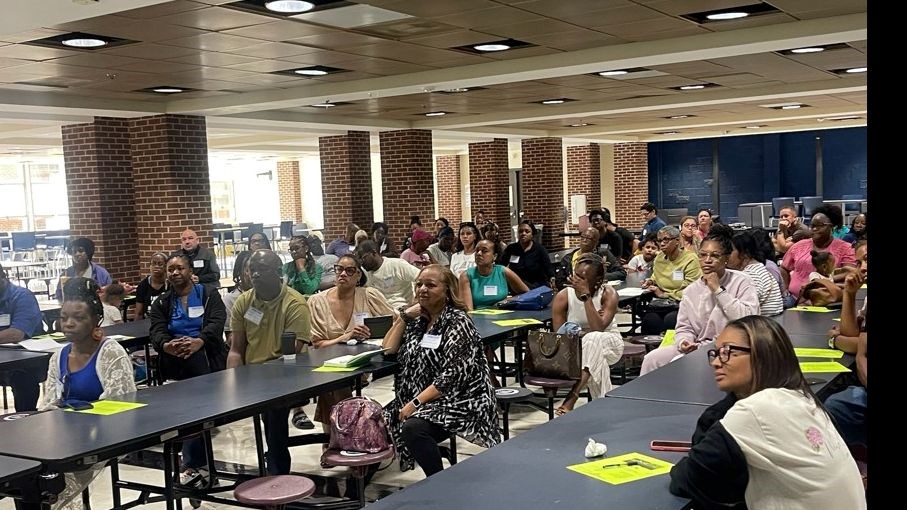 Rising 9th grade parents attending a Title I meeting