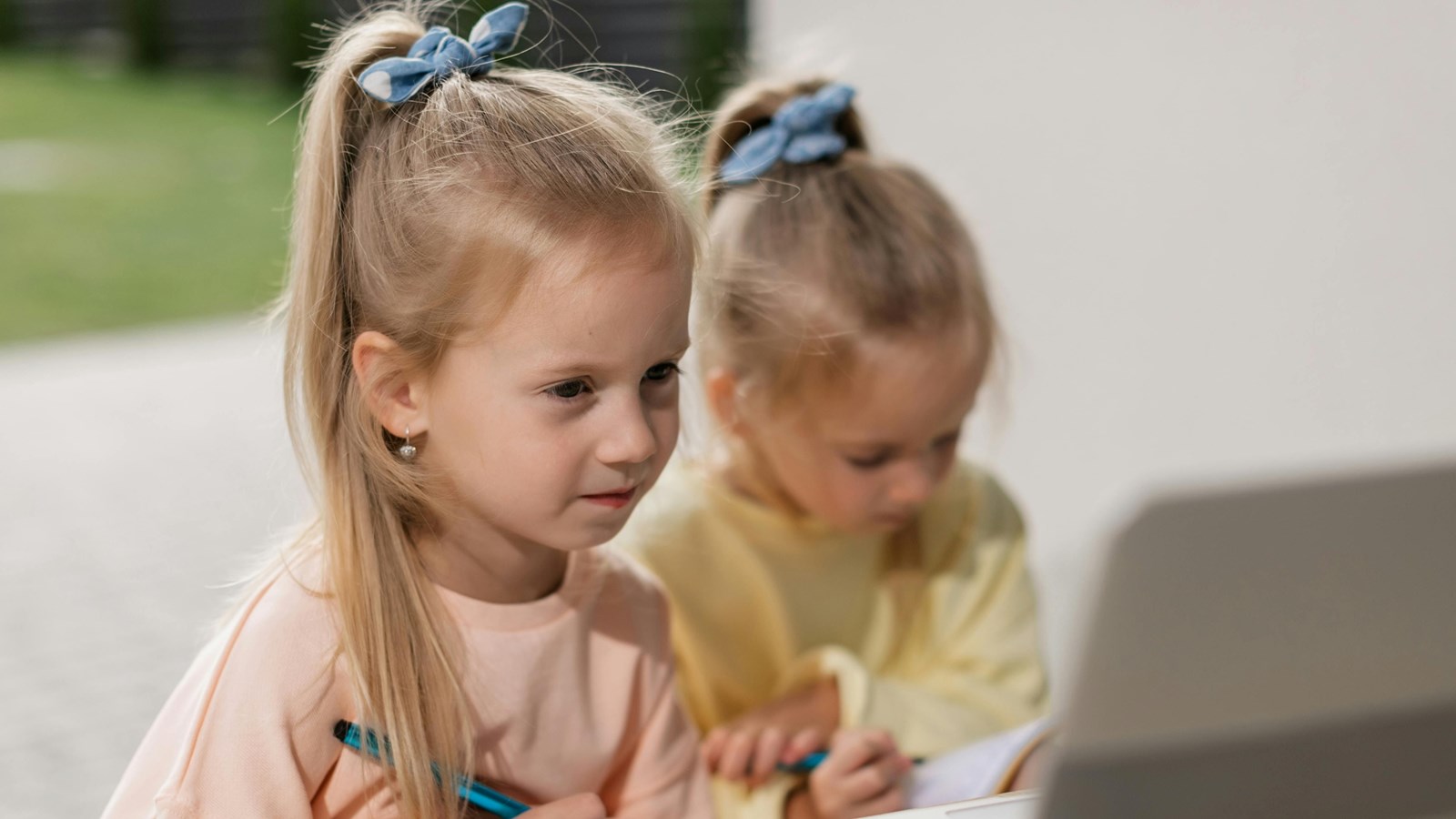 two girls on a computer