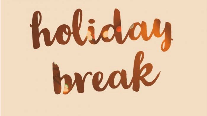 the words "holiday break" in cursive with a cream background