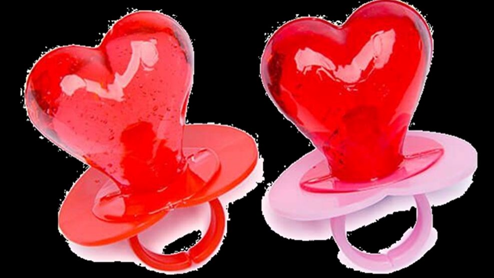 two red ring pops on plain background