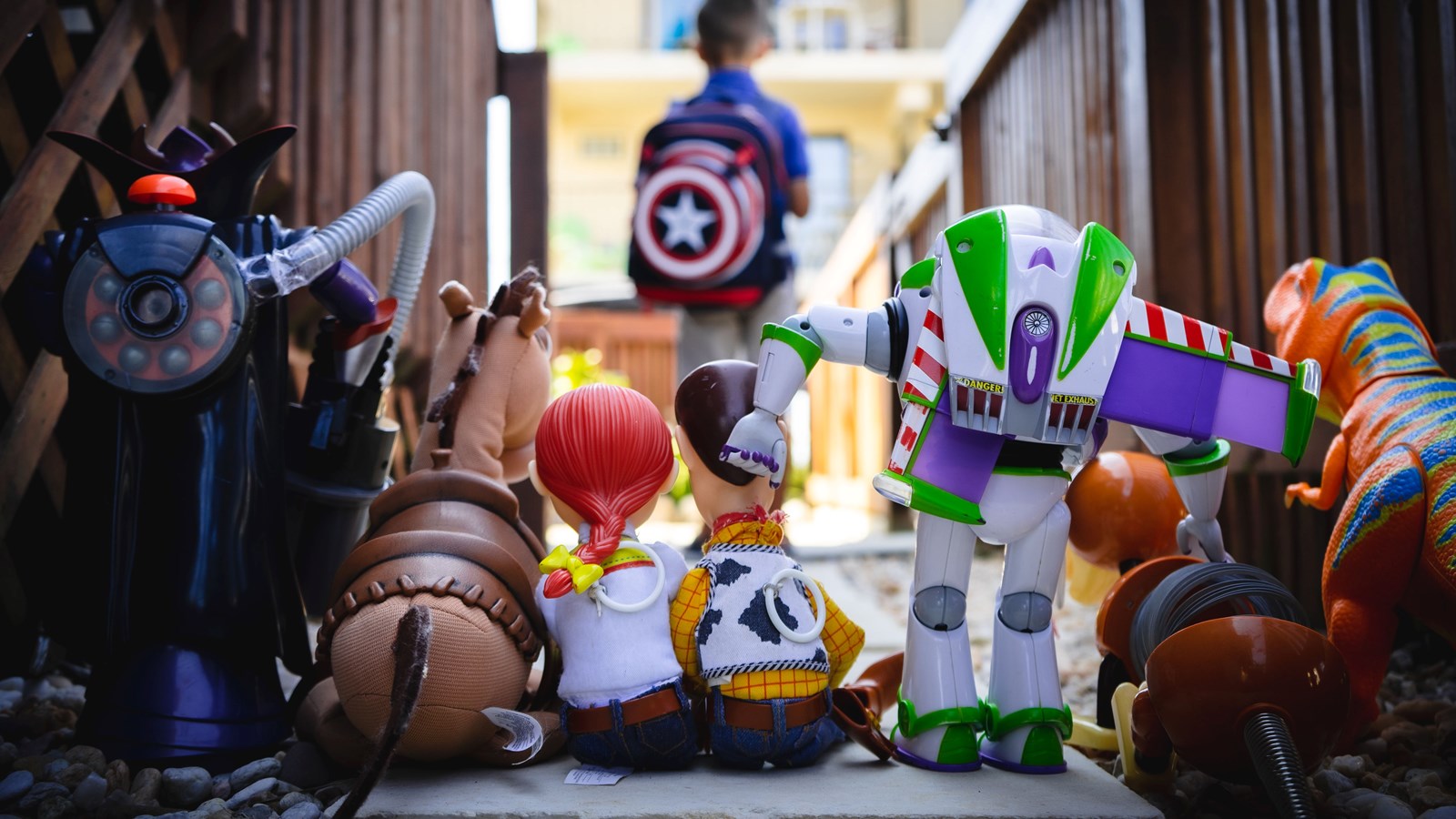 Pixar toy story characters watching a student