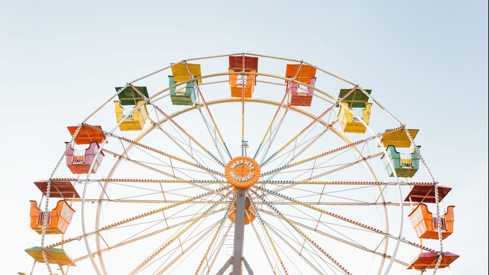 ferris wheel with multi-colored cars