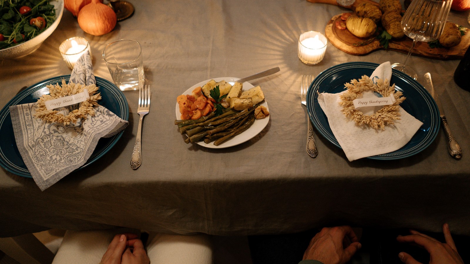 thanksgiving table with food and candles