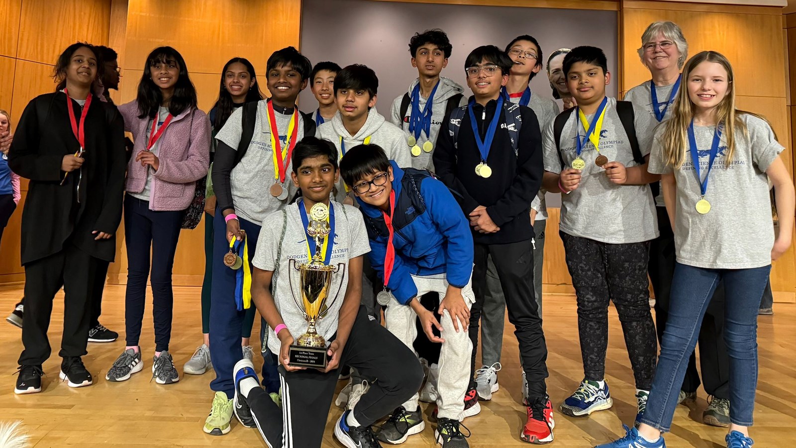 Science Olympiad Team holding trophy