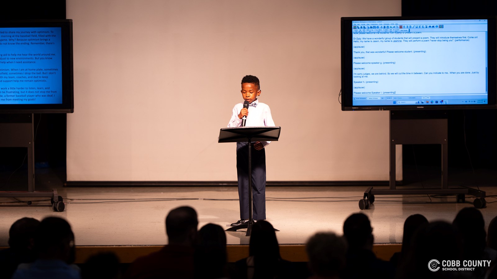 A student delivers their speech during the Cobb Schools Oratorical Contest at Pine Mountain Middle School.