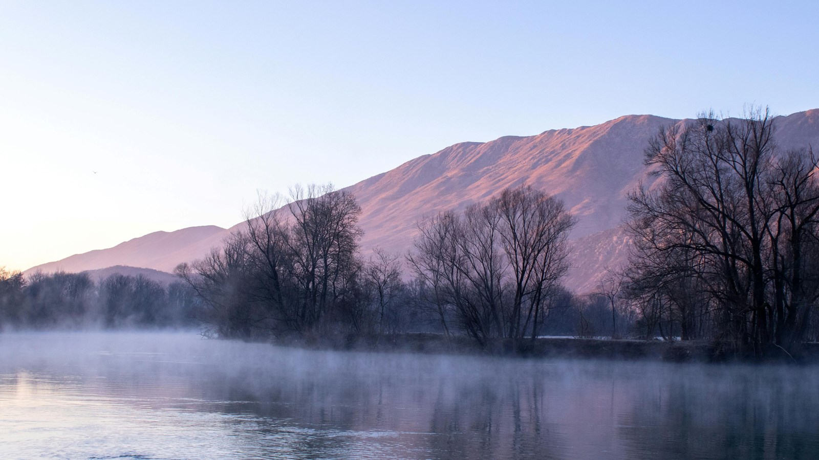 river with mountain in background